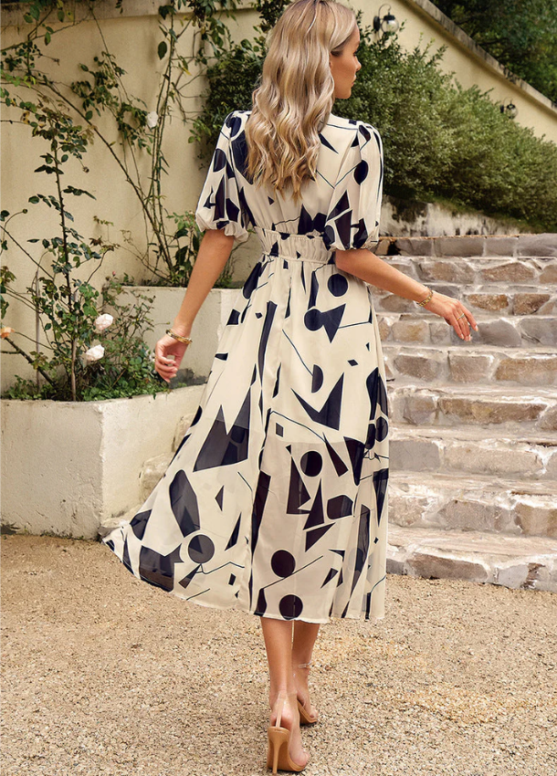 Astella | Flattering Floral Midi Dress