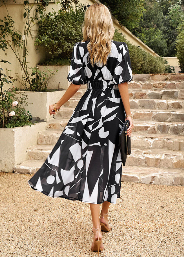 Astella | Flattering Floral Midi Dress